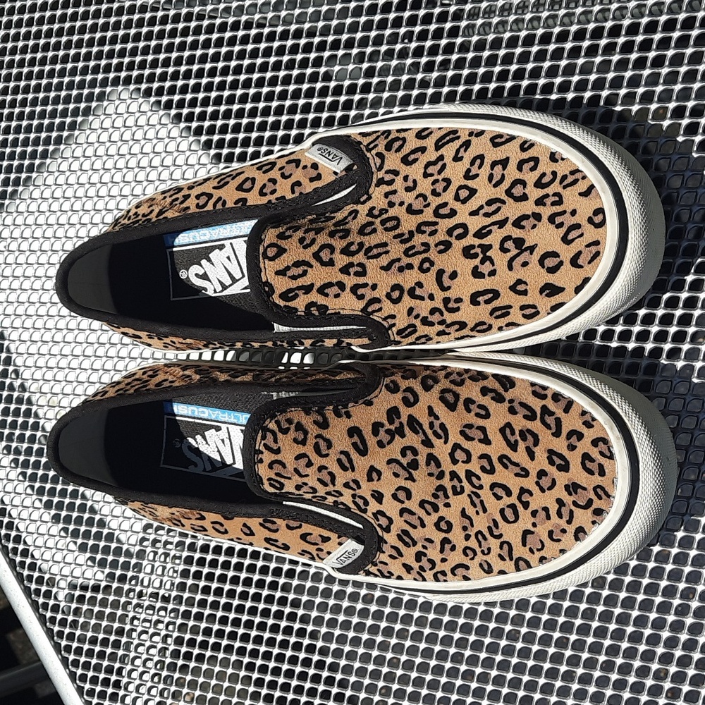 Vans Leopard Print Slip-On Sneakers in Tan and Black